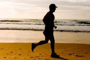 A runner on the beach.