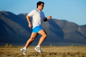 A runner maintaining a healthy and active lifestyle through jogging.