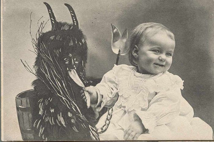 Postcard featuring a child and Krampus