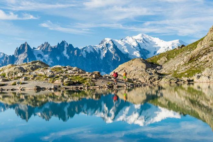 Two adventurers trekking near Lac Blanc on the Tour du Mont Blanc.