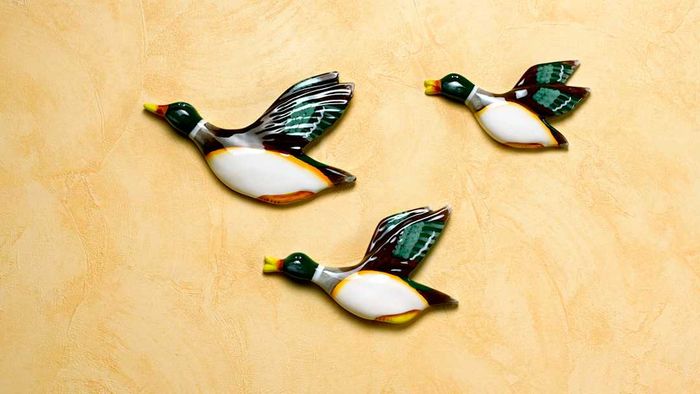 Kitsch retro flying duck figurines