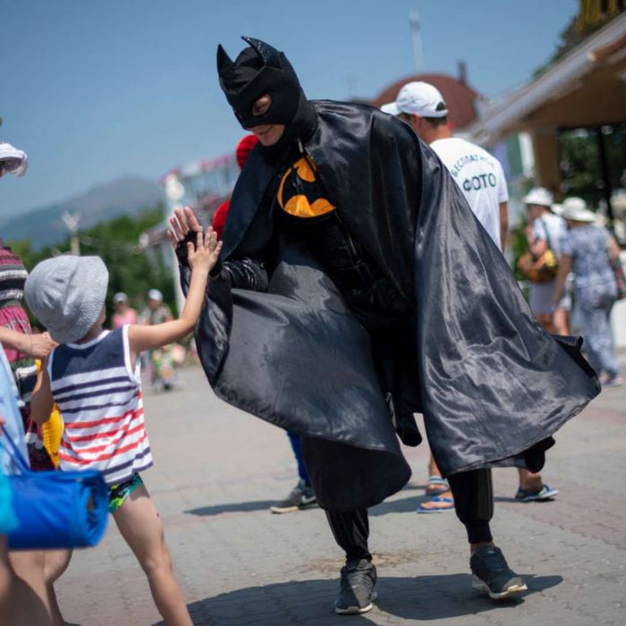 A photo of a man dressed as Batman