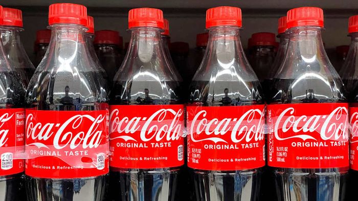 Bottles of Coca-Cola are shown