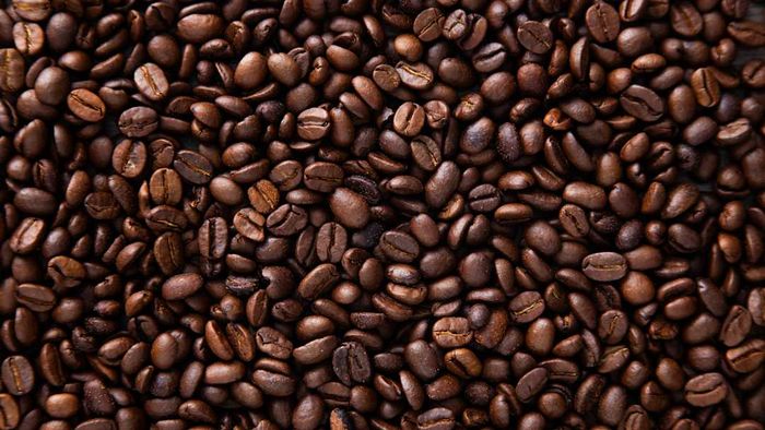 Roasted coffee beans are shown in the image