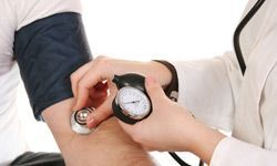 hands holding a stethoscope
