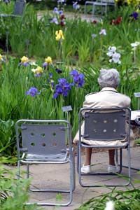 elderly woman sitting by herself