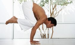 a man practicing yoga