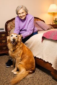 elderly woman with a dog
