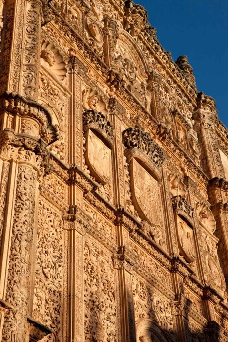 Sculptures adorning a building at the University of Salamanca.
