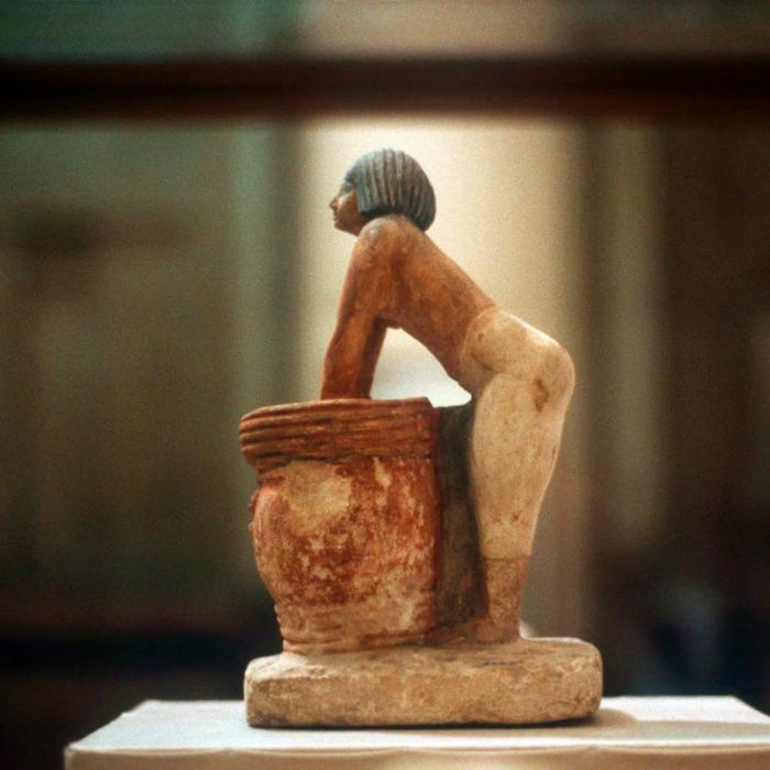 A model from an Egyptian tomb in Meketra (circa 2160 BCE) depicts a person brewing beer.