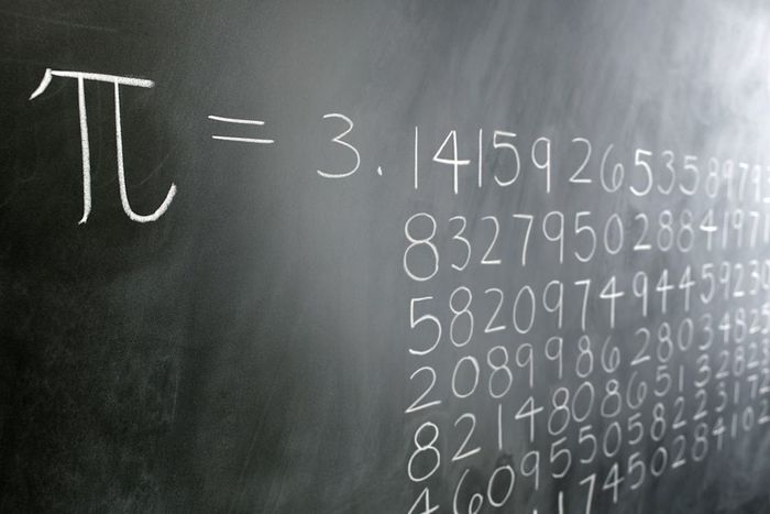 Pi written on a chalkboard