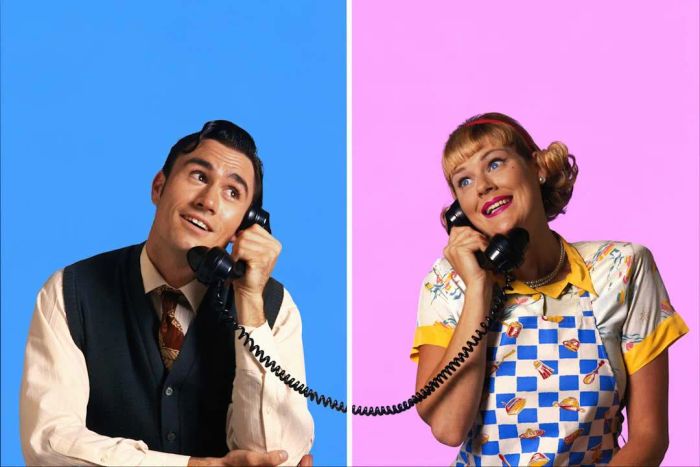 1950s couple chatting on the phone.