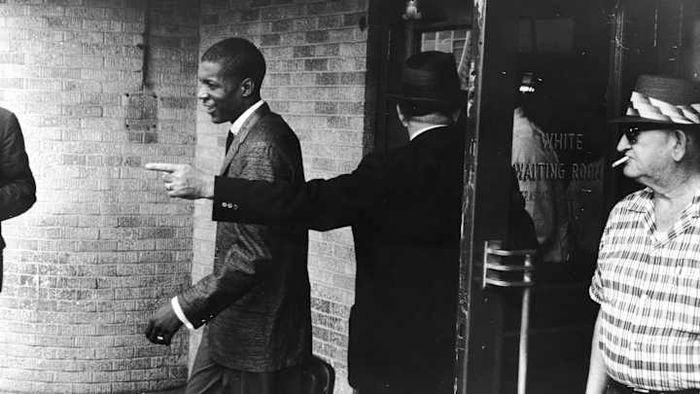 A Freedom Rider being forcibly removed from a bus terminal in 1961.