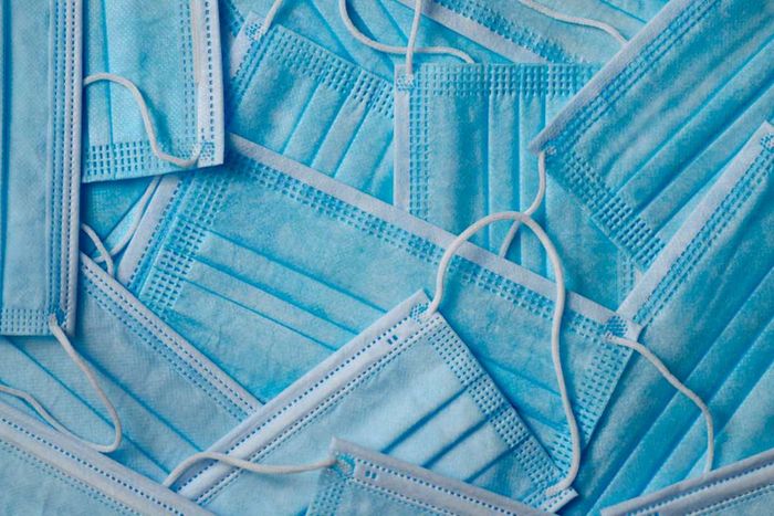 Surgical face masks stacked together