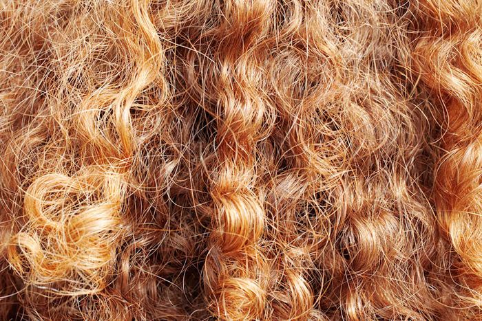 Curly red hair