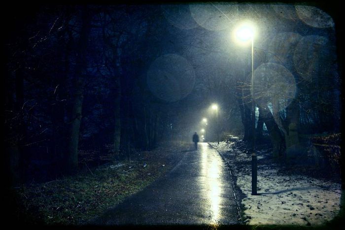 Man walking down quiet lane