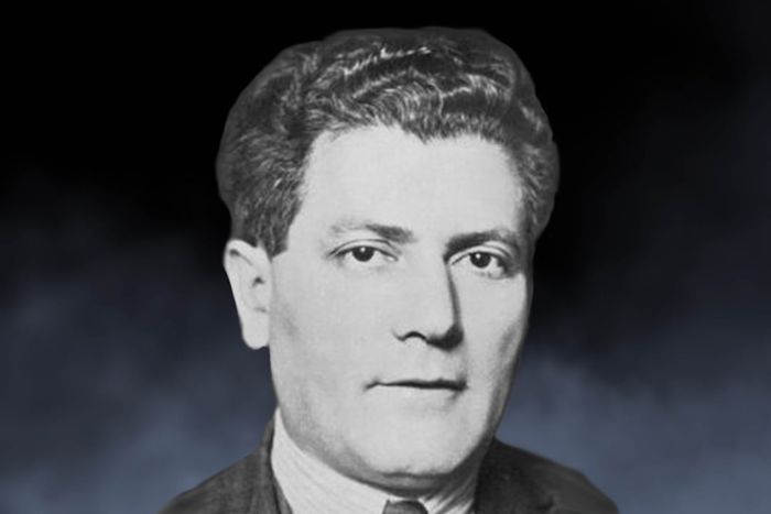 Portrait of Nandor Fodor set against a smoky backdrop.