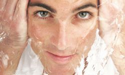 a man washing his face