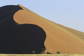 rolling sand dunes in the desert