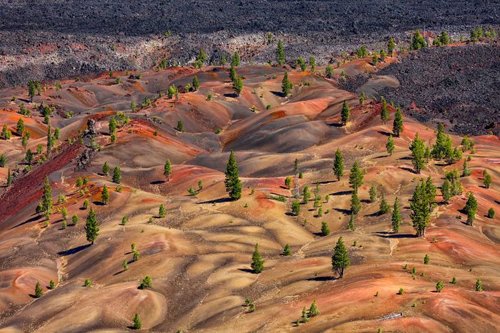The painted dunes at Lassen Volcanic National Park feature vibrant volcanic pumice fields.