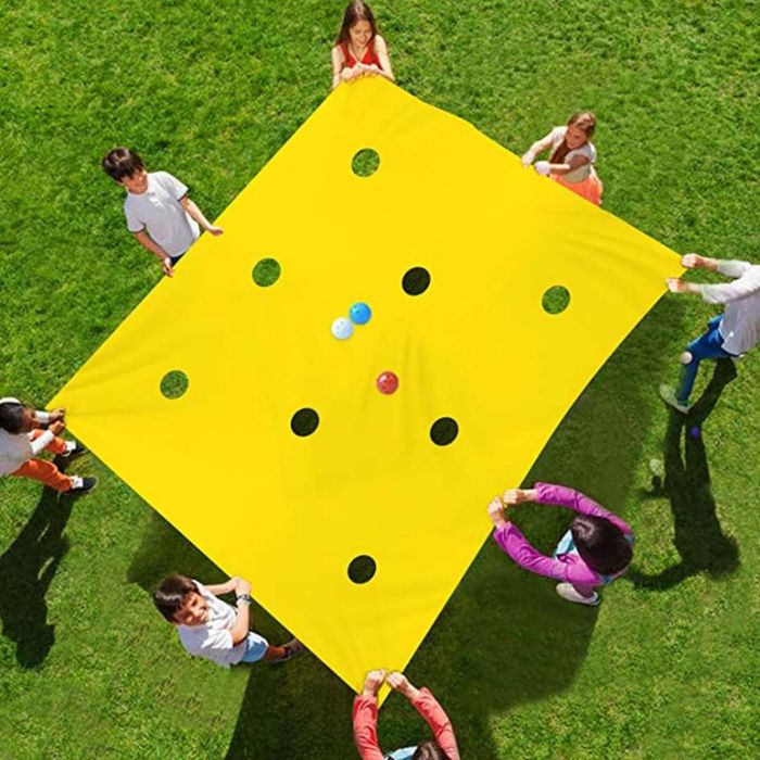 Holes in tarp yard game