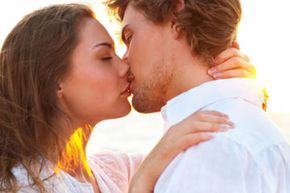 romantic couple sharing a kiss