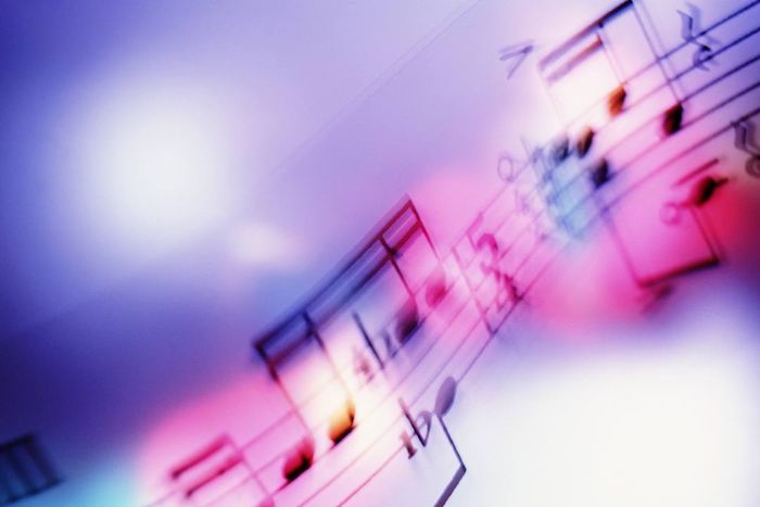 Lines of blurry sheet music