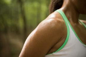 woman jogging and perspiring