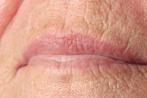 Close-up view of a woman's lips.