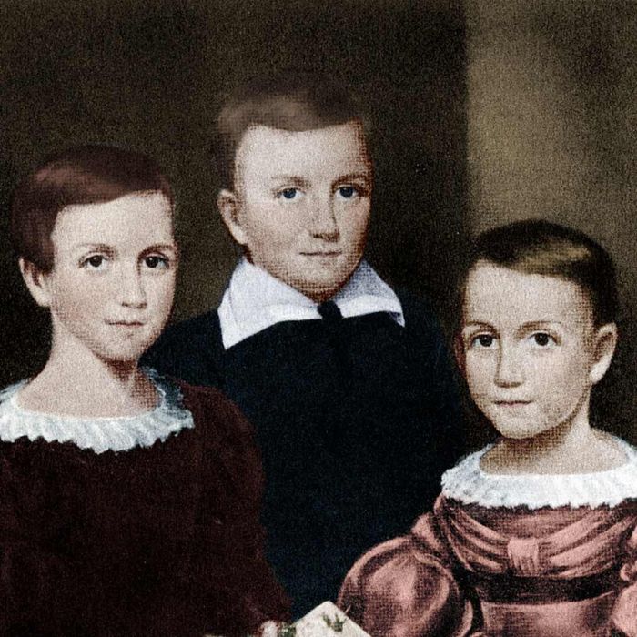 Emily Dickinson is shown alongside her siblings, Austin and Lavinia.