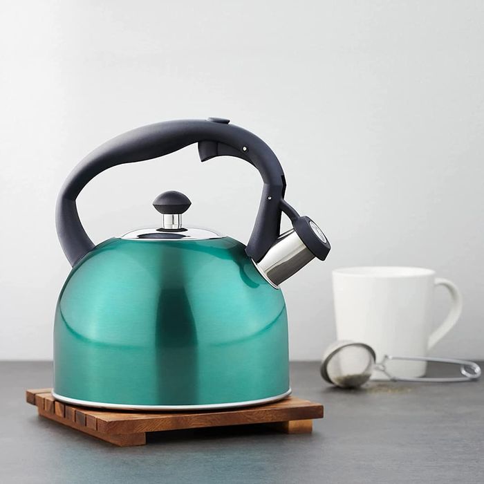 Top Amazon Basics Kitchen Essentials Under $50: Amazon Basics Stainless Steel Tea Kettle shown in teal.