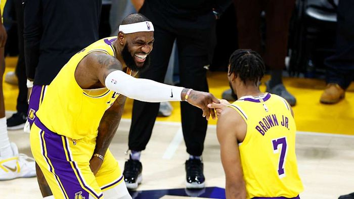 LeBron James and Troy Brown Jr. are pictured
