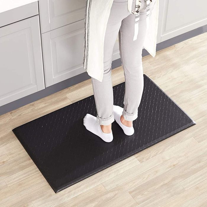 Top Amazon Basics Kitchen Essentials Under $50: Amazon Basics Anti-Fatigue Standing Comfort Mat featured here.