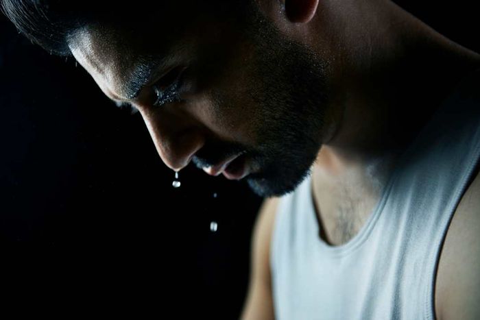 A man perspiring