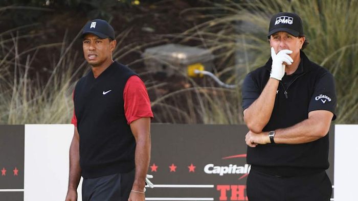 An image of Tiger Woods and Phil Mickelson is shown