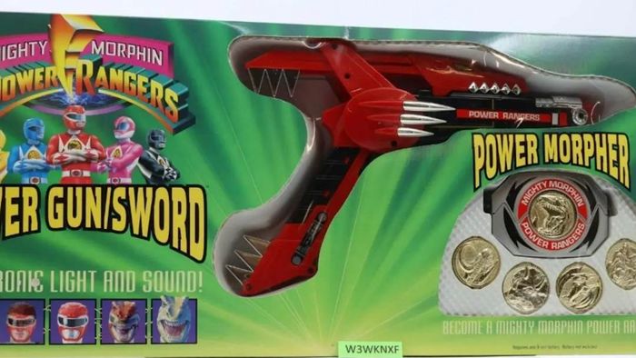The 1993 Mighty Morphin Power Rangers Power-Gun Sword Morpher is displayed here.