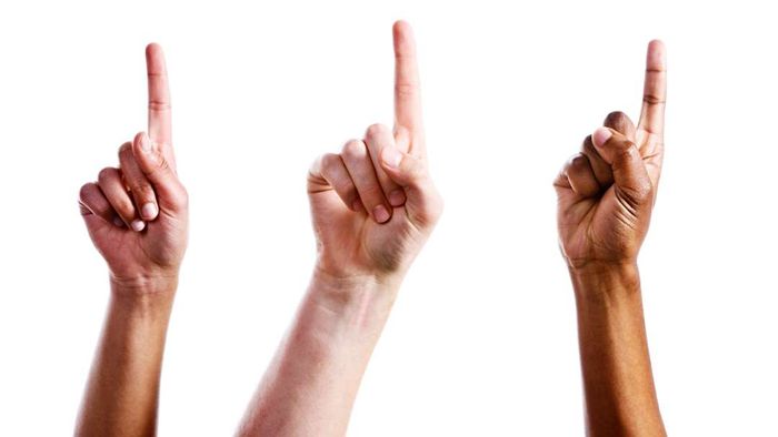 Three hands with their index fingers pointed outward.