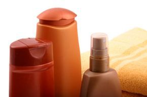 Cosmetic bottles filled with beauty products.