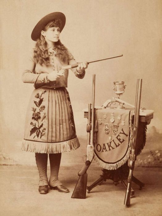 A photograph of Annie Oakley taken in 1887.