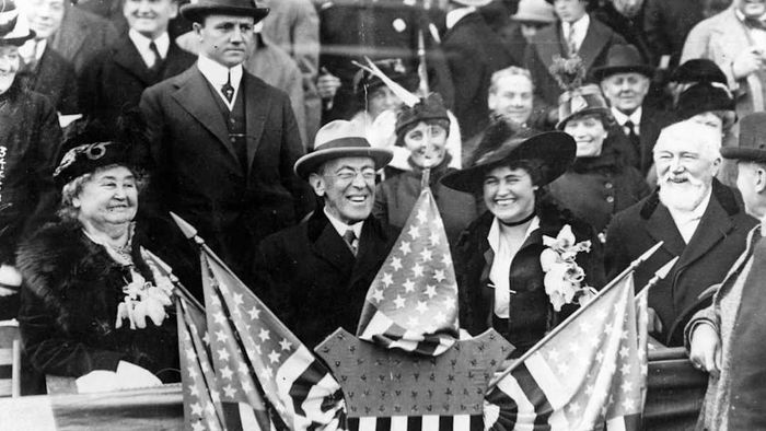 Woodrow and Edith Wilson attending a patriotic event.