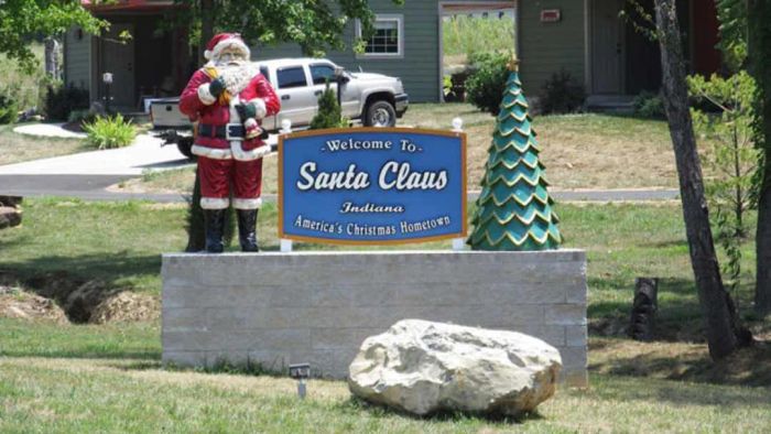 A welcoming sign greets visitors to Santa Claus, Indiana.