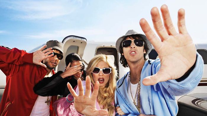 A group of imitation celebrities is shown