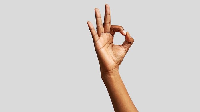 A woman's hand is shown