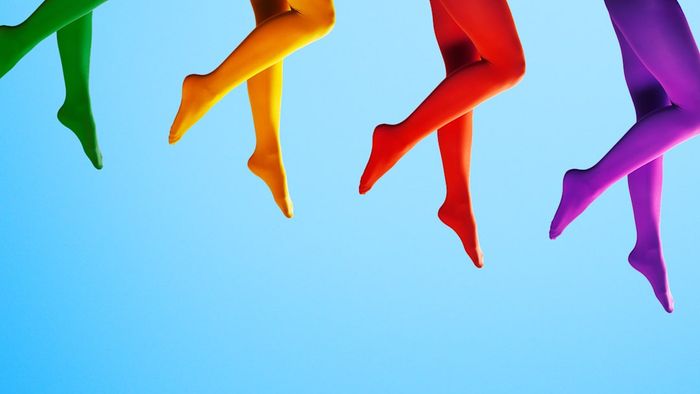 four legs adorned with stockings of various colors