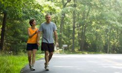 couple walking along a road