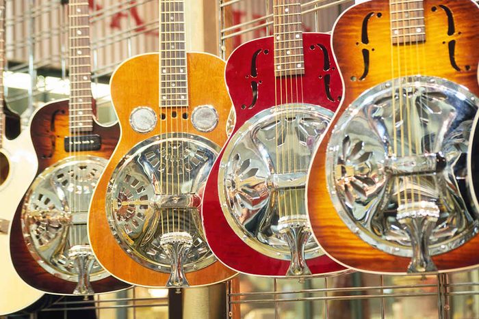 Guitars displayed in a music shop.