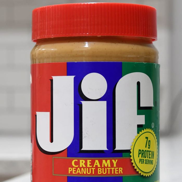 A photo illustration depicts a jar of Jif peanut butter...
