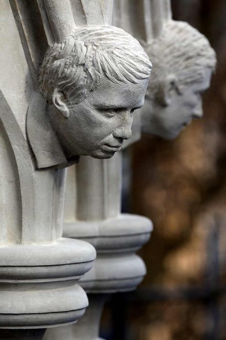 Grotesques resembling humans in Westminster Abbey's Chapter House.