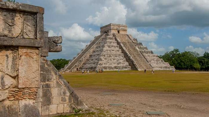 Visitors gather at the Maya Temple of Kukulcan in Yucatán, Mexico.