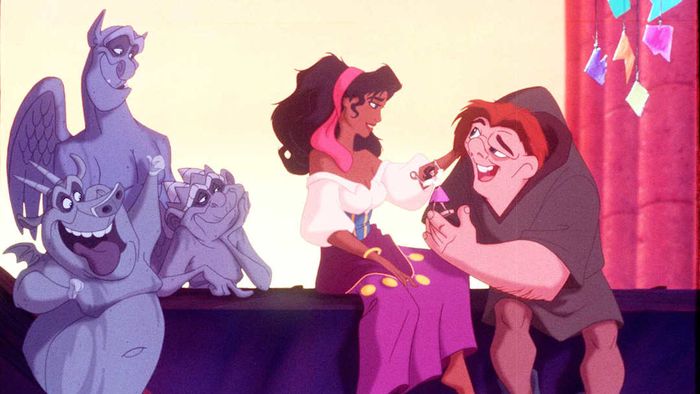 June 1996: From the film 'The Hunchback of Notre Dame,' the gypsy Esmeralda extends a helping hand to Quasimodo.